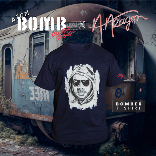 the Bomber men's short-sleeve t-shirt by Atom Bomb delivers the cut and quality you look for in a classic crewneck tee. Details like a lay-flat collar and shoulder-to-shoulder taping are standard in a men's t-shirt designed to last. Printed across the front is a menacing illustration of rapper Atom Bomb drawn by Phoenix illustrator Angelina Aragon and inspired by the police sketch of Unibomber Ted Kaczynski.