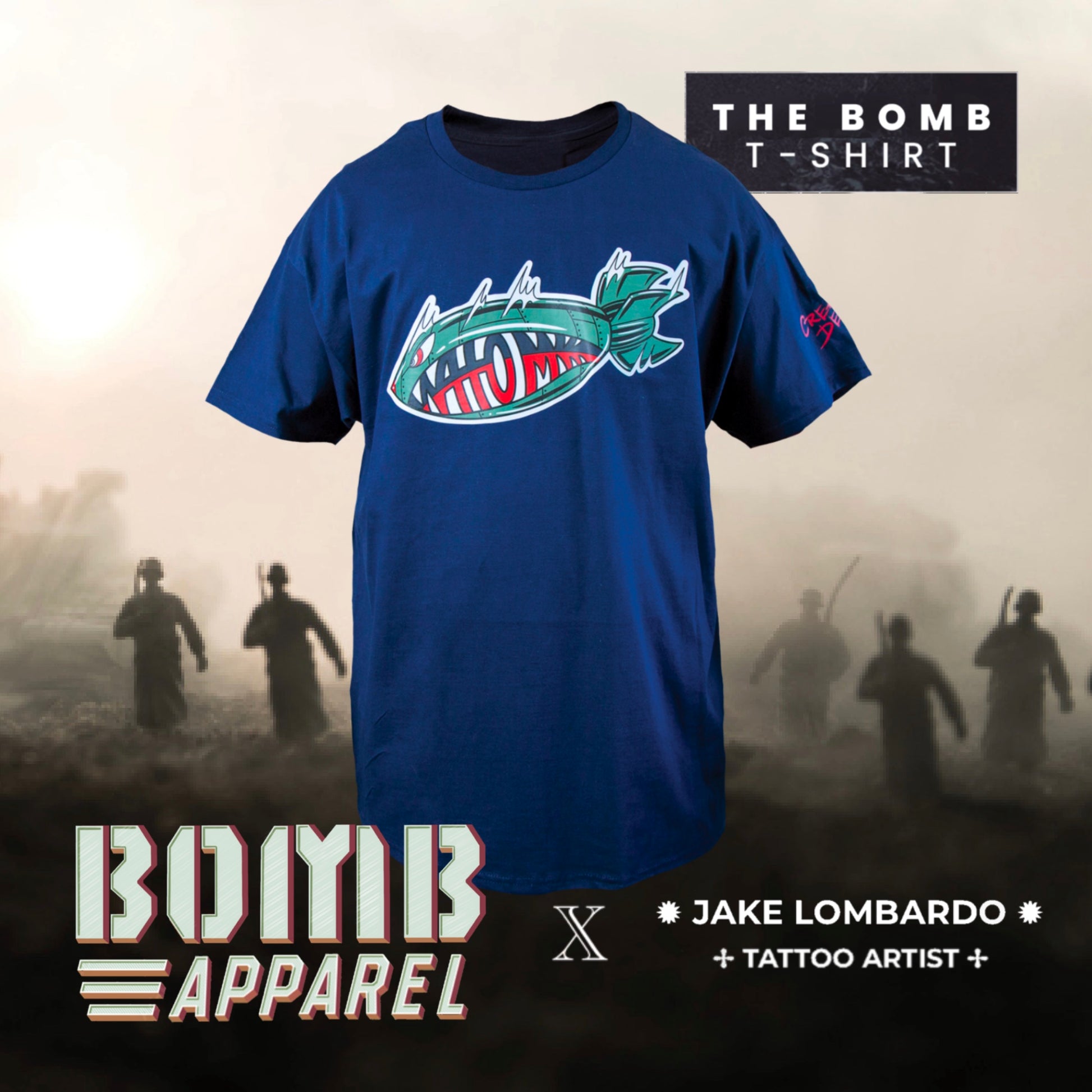 Men's navy blue t-shirt with a graphic design of a stylized fish and the Rapper Atom Bombs original logo on the front, marketed by Jake Lombardo + Atom Bomb Apparel.
